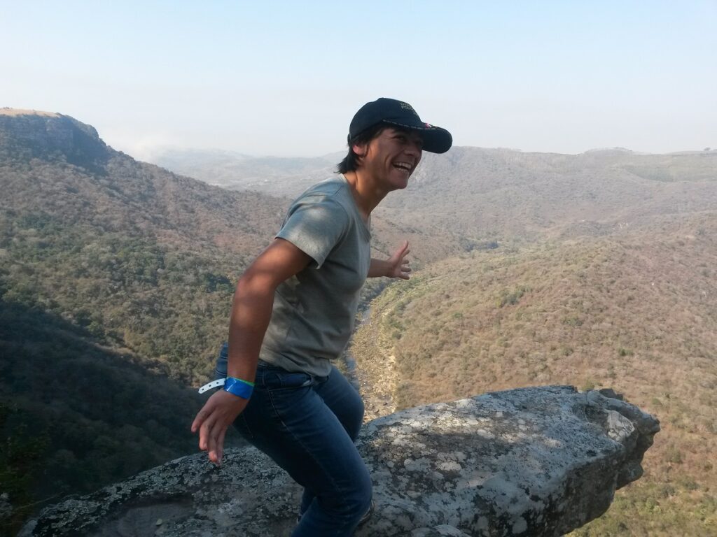 Woman on edge of cliff